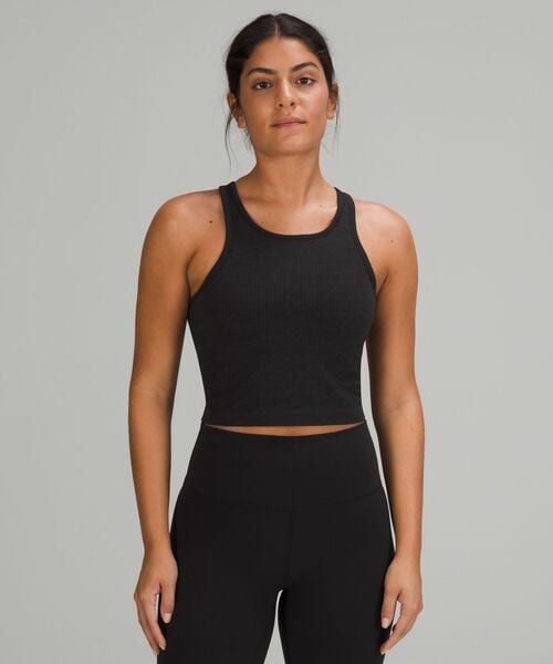 Lululemon Ebb Ribbed Tank (Size 4 & 6) (Category: Activewear) located in Manila. Submitted by thriftfinds_309 (Listing ID 1467601755, Image 2). Description: - Brand: Lululemon - Style: Ribbed crop tank with racerback and classic back logo - Support: Built-in shelf bra for extra convenience - Fabric: Smooth, stretchy, and buttery soft - Fit: Hits right at the waistline - Condition: Brand new with tag size visible inside collar - Ideal for: Gym wor