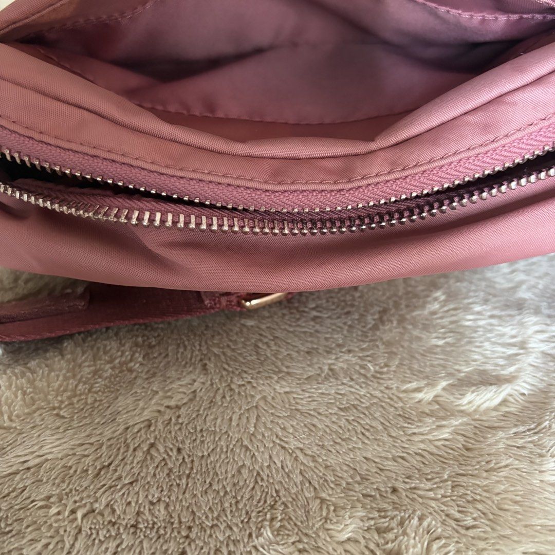 Lululemon Everywhere Crossbody Bag 2L (Category: Cross-body Bags) located in San Juan City. Submitted by _ands_ (Listing ID 1467465106, Image 3). Description: - Color: Toasted Pink/Rose Gold - Good as new; no flaws .