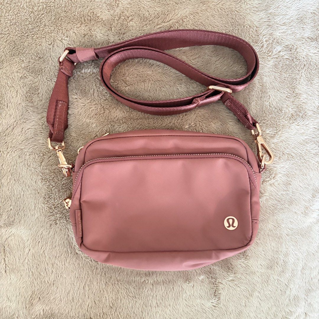 Lululemon Everywhere Crossbody Bag 2L (Category: Cross-body Bags) located in San Juan City. Submitted by _ands_ (Listing ID 1467465106, Image 1). Description: - Color: Toasted Pink/Rose Gold - Good as new; no flaws .