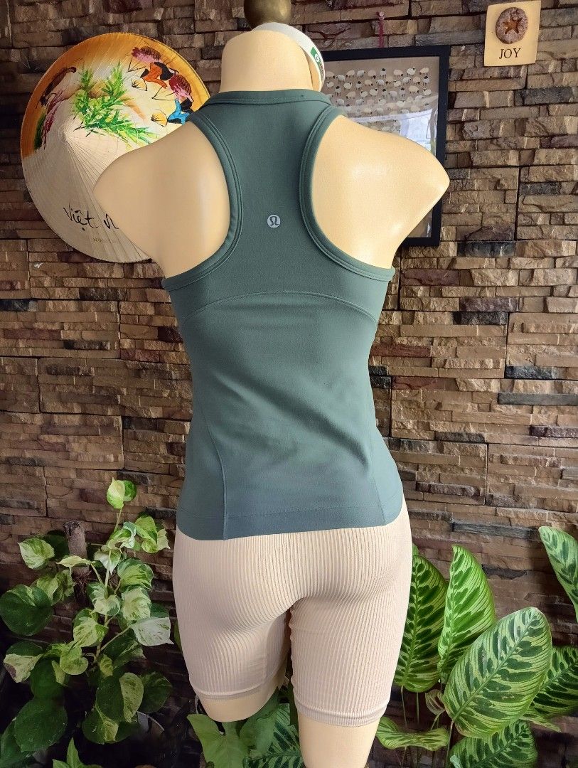 Lululemon Align Tank Top (Category: Activewear) located in Rizal. Submitted by timeless_shop (Listing ID 1467403281, Image 3). Description: ORIGINAL Lululemon Align Racerback Tank Top - Dark Forest - Size 6 👚 Fit to Small to Medium Frame Bust Size 32-34 🎨 Color: Dark Forest / Sage Green 🧵 Material: Nulu Fabric - buttery soft, lightweight, 4-way stretch 💯 Condition: 9.8/10 - Like New! 🎨 Color Rate: 9.8/10 - Hindi kupas, walang himulmol - Maay