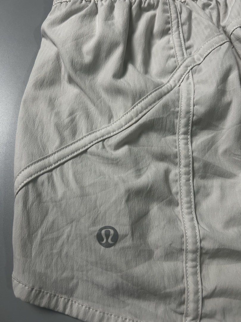 Lululemon Track That Mid-Rise Short 3" (Category: Shorts) located in Tacloban City. Submitted by azthrifting24 (Listing ID 1467578559, Image 3). Description: - Brand: Lululemon - Size: 8 (tag intact) - Color: Neutral light beige - Fit: Mid-rise with a comfortable ribbed waistband - Features: Handy back zip pocket and signature logo near the hem - Material: Lightweight and breathable - Condition: Great for workouts or casual daytime wear.