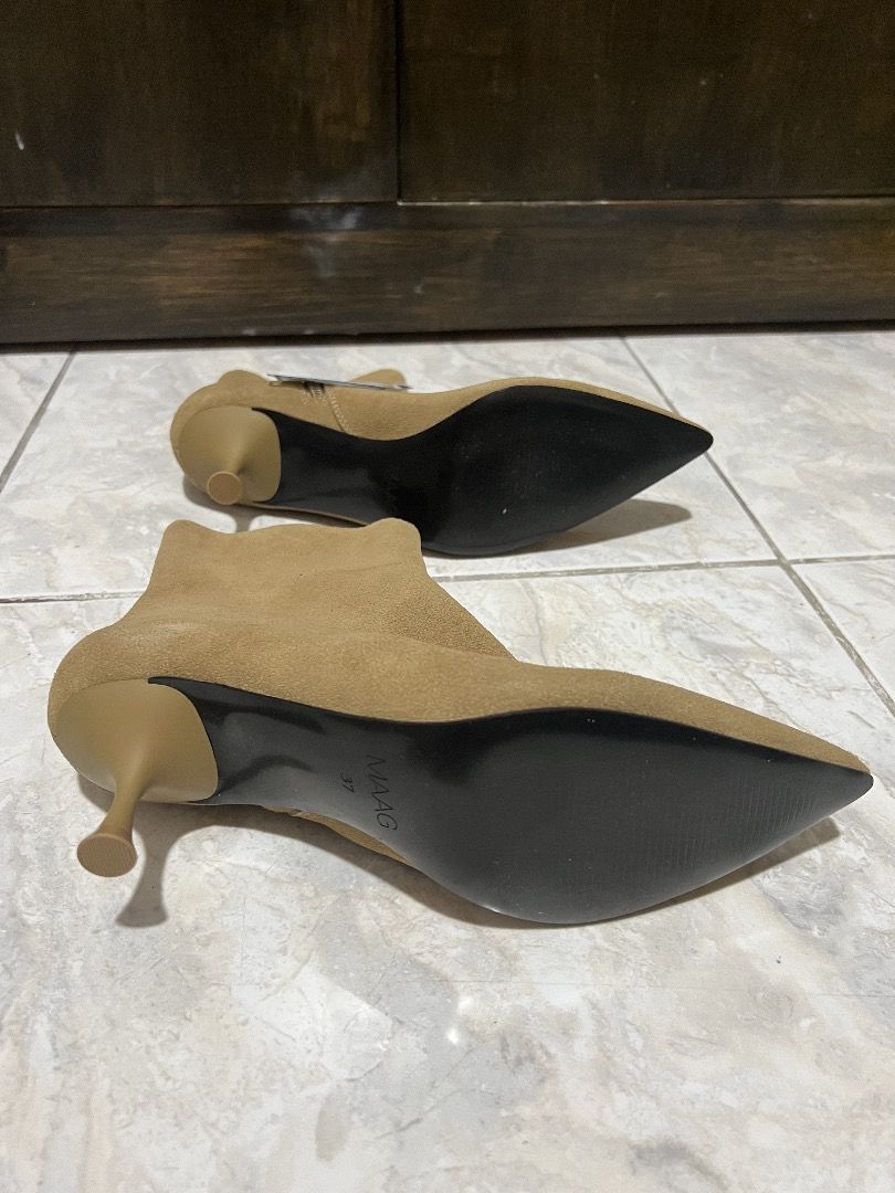 MAAG Brown Pointed Toe Kitten Heel Ankle Boots Size 37 (Category: Boots) located in Quezon City. Submitted by lucky.hyacinth (Listing ID 1467369540, Image 2). Description: - Brand: MAAG - Size: 37 - Style: Pointed toe ankle boots with slender kitten heel - Material: Suede texture upper in warm brown / tan - Closure: Side zipper - Condition: Brand new with original store tags attached - Soles: Clean black soles.