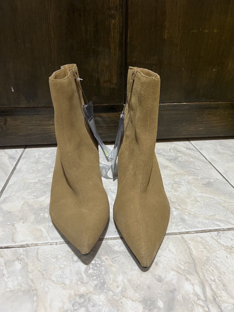 MAAG Brown Pointed Toe Kitten Heel Ankle Boots Size 37 (Category: Boots) located in Quezon City. Submitted by lucky.hyacinth (Listing ID 1467369540, Image 1). Description: - Brand: MAAG - Size: 37 - Style: Pointed toe ankle boots with slender kitten heel - Material: Suede texture upper in warm brown / tan - Closure: Side zipper - Condition: Brand new with original store tags attached - Soles: Clean black soles.