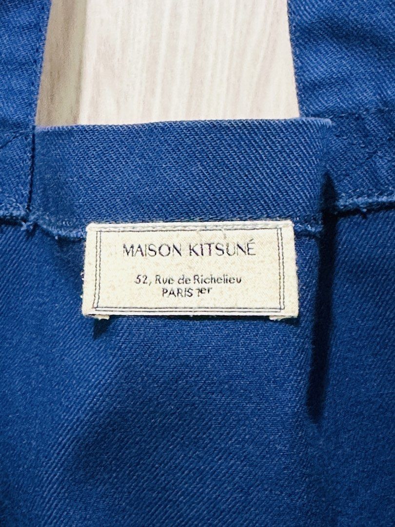Maison Kitsune Tote Bag (Category: Tote Bags) located in Quezon City. Submitted by mikemofu (Listing ID 1467396350, Image 3). Description: Authentic Maison Kitsune Navy - London logo Issue: the printed logo is fading - it is common issue for this particular model.