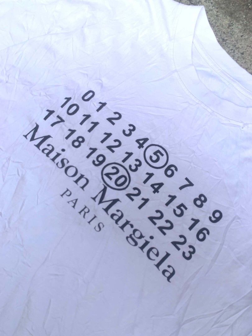 Maison Margiela numeric logo white T-shirt (Category: Activewear) located in Canlaon. Submitted by thriftytrift (Listing ID 1467521207, Image 2). Description: 10/10 color rate dimes:23/29 Condition:9/10.
