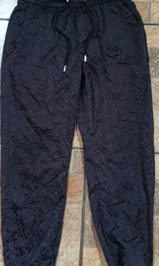 Mangano patterned garment tag size 170/74A (Category: Formal Shirts) located in Rizal. Submitted by judithtillo19 (Listing ID 1467432179, Image 3). Description: - Brand/Item: Mangano piece - Design: Dark patterned fabric with a unique textured finish - Size: 170/74A - Care Instructions: Turn inside out for washing and ironing; hand wash or gentle machine cycle recommended to maintain fabric quality.