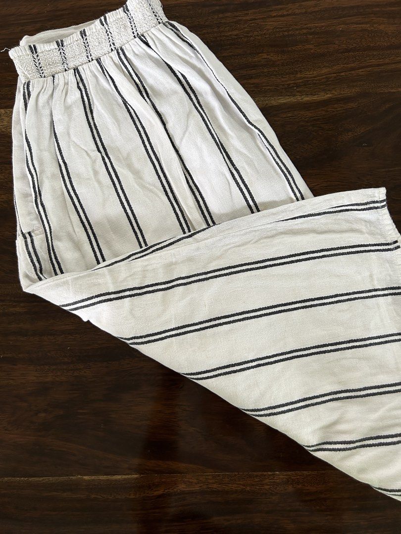 Mango Casual Striped Skirt Size XS (Category: Skirts) located in Muntinlupa City. Submitted by manikascloset (Listing ID 1467393871, Image 1). Description: Mango Casual Striped Skirt White and black stripes Elastic smocked waistband, lightweight fabric - Perfect for: Warm weather, pairs easily with basic tees or tanks.