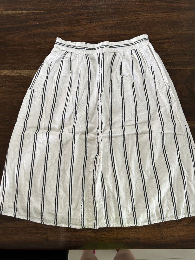 Mango Casual Striped Skirt Size XS (Category: Skirts) located in Muntinlupa City. Submitted by manikascloset (Listing ID 1467393871, Image 3). Description: Mango Casual Striped Skirt White and black stripes Elastic smocked waistband, lightweight fabric - Perfect for: Warm weather, pairs easily with basic tees or tanks.