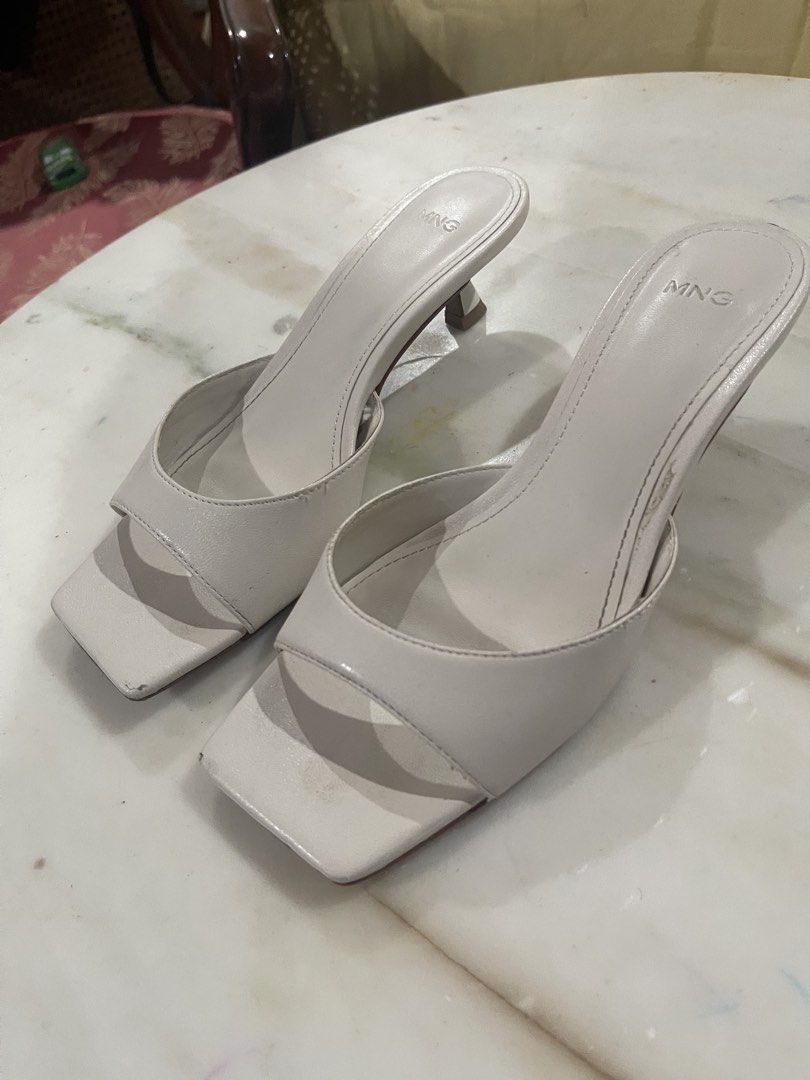 Mango ecru kitten heels size 5 (Category: Heels) located in Quezon City. Submitted by shopnkeep (Listing ID 1467597631, Image 3). Description: Mango Size 5 Color ecru Kitten heels Purchased 2645 Selling 1300 only! Mop: bpi gcash Shipping: c/o buyer .