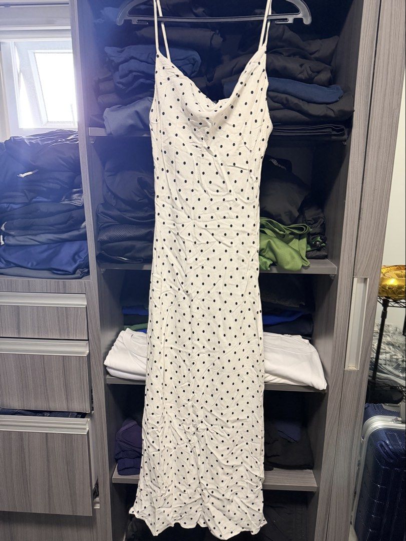 Mango Polka Dot Maxi Dress (Category: Dresses) located in Bacoor. Submitted by hellonikka (Listing ID 1467384383, Image 2). Description: - Brand: MNG - Style: Midi dress with cowl neck and thin spaghetti straps - Pattern: White with all-over black polka dots - Fabric: Lightweight and flowy - Size: S / EUR S / USA 4 / MEX CH - Condition: Worn once, excellent shape.