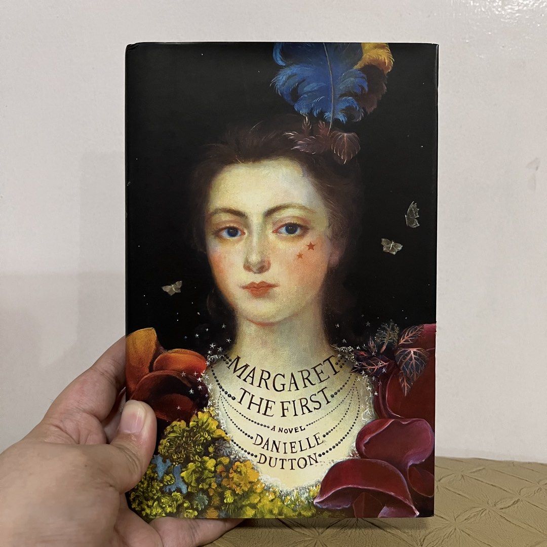 Margaret the First by Danielle Dutton (Category: Storybooks) located in San Pedro. Submitted by rainyydayy (Listing ID 1467548674, Image 1). Description: - Title: Historical fiction novel by Danielle Dutton - Publisher: Scribe - Format: Hardcover with dust jacket (portrait artwork) - Condition: Pages show minor age spotting along the edges - ISBN: 9781925228830.