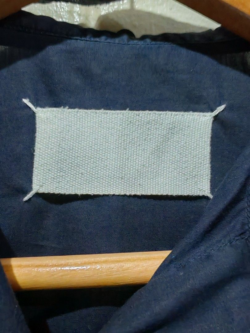 Margiela blank tag (Category: Longsleeves) located in Makati City. Submitted by kuya_uwi_kana (Listing ID 1467473557, Image 3). Description: MARGIELA blank tag PIT TO PIT - 18.5 LENGTH - 25.5 SHOULDER - 15.5 SLEEVES - 23.