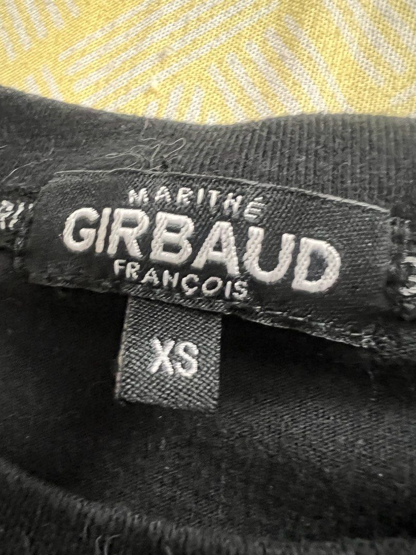 Marithe Francois Girbaud Black Crop T-Shirt XS (Category: Shirts) located in Caloocan City. Submitted by queensproduct (Listing ID 1467454430, Image 3). Description: - Brand: Marithe Francois Girbaud - Size: XS - Color: Black - Material: 100% Cotton, relaxed fit - Details: Lettuce hem on cuffs and bottom, green logo on chest, branded inner collar - Condition: Brand new/Excellent - Perfect to pair with high-waisted jeans or skirts.