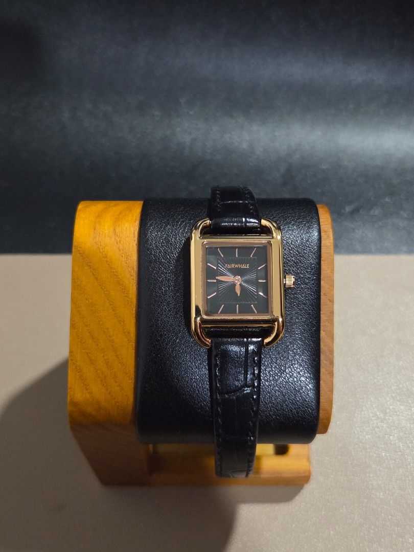 Mark Fairwhale Womens Quartz (Category: Women's Watches) located in Mabalacat. Submitted by watcherwristph (Listing ID 1467500768, Image 1). Description: Mark Fairwhale Women's Watch – Model 3570 | Black & Gold A sleek, minimalist timepiece featuring a square gold-tone case, a striking black sunray dial, and a black leather strap. A versatile design that pairs well with both casual outfits and more formal looks. Specifications: - Brand: Mark Fair