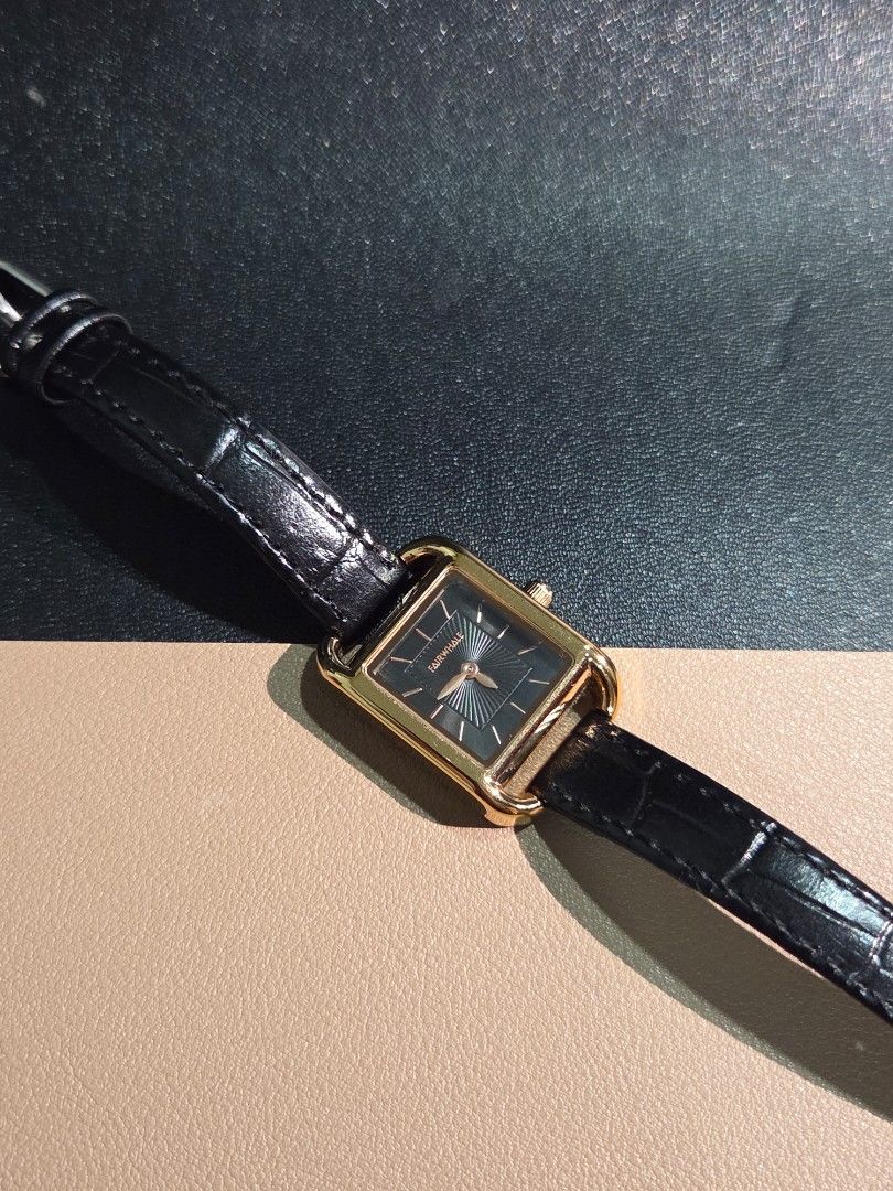 Mark Fairwhale Womens Quartz (Category: Women's Watches) located in Mabalacat. Submitted by watcherwristph (Listing ID 1467500768, Image 3). Description: Mark Fairwhale Women's Watch – Model 3570 | Black & Gold A sleek, minimalist timepiece featuring a square gold-tone case, a striking black sunray dial, and a black leather strap. A versatile design that pairs well with both casual outfits and more formal looks. Specifications: - Brand: Mark Fair