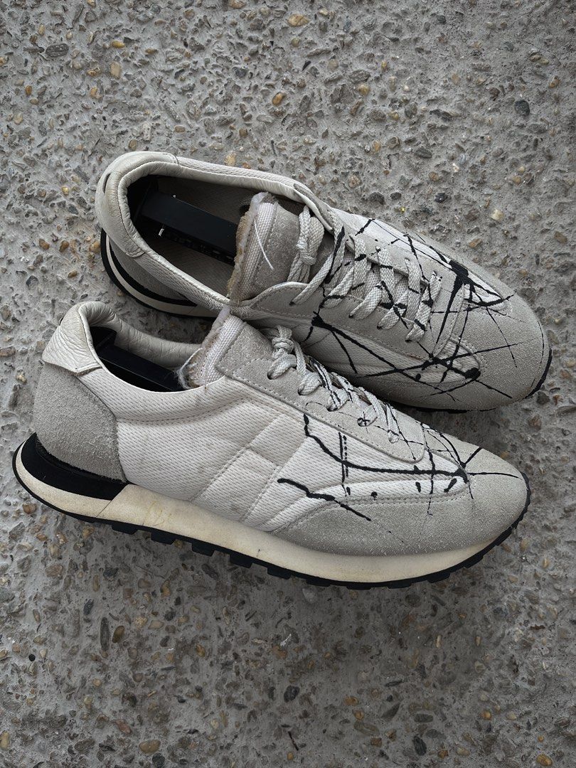 Martin Margiela Replica Paint Runners Light Grey (Category: Sneakers & Footwear) located in Dasmarinas. Submitted by bandananowheree (Listing ID 1467393706, Image 1). Description: The Maison’s iconic lace-up Replica runners are crafted from mixed materials including leather and cotton. The sneakers feature a paint splatter effect setting a youthful tone. Made in Italy. Item details 38 IT on tag 25cm 7US Mens 100% Polyester, Bovine leather Suede e