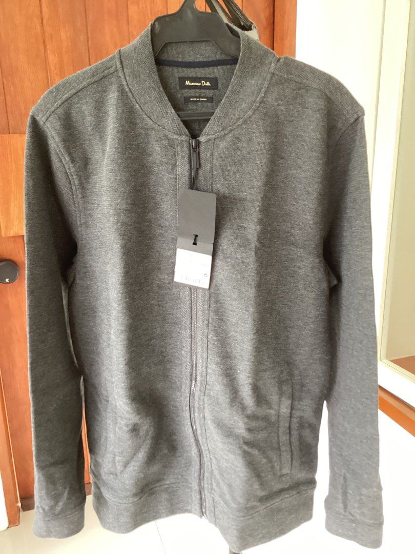 Massimo Dutti Grey Knit Bomber Jacket (Category: Coats, Jackets and Outerwear) located in Bacoor. Submitted by jyano (Listing ID 1467375290, Image 2). Description: - Brand: Massimo Dutti - Style: Knit bomber jacket with full zip closure - Color: Dark Grey - Size: Medium (UK 38) - Condition: Brand new with original store tags attached - Features: Functional side pockets, ribbed collar, cuffs, and hem - bought it for 3990.00 / price on tag.