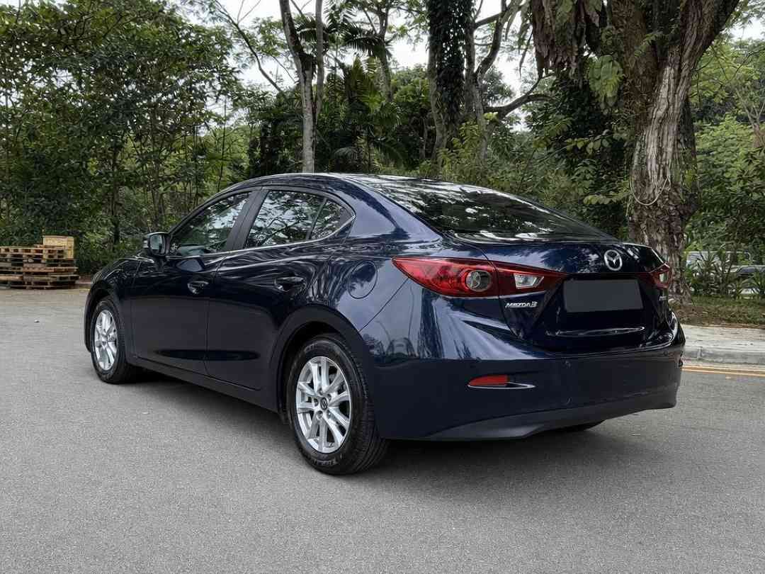 Mazda 3 Sedan 1.5 Deluxe (A) (Category: Used Cars) located in Singapore. Submitted by carousell_certified_partners (Listing ID 1462590932, Image 3). Description: 1 owner low mileage unit! Engine & gearbox warranty coverage till end of COE! A very economical & yet sporty hatchback with low maintenance & great fuel efficiency! Very well maintained unit with no major repairs needed! Flexible financing available at low interests! Trade ins are availa
