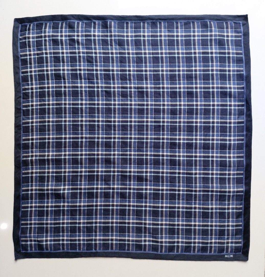 MCM Blue Plaid Pocket Square Handkerchief (Category: Handkerchief & Pocket Squares) located in Lapu Lapu. Submitted by agnesapm_29813 (Listing ID 1467503289, Image 3). Description: - Brand: MCM - Color/Pattern: Navy blue with white and blue classic tartan plaid - Size: Approximately 18 x 18 inches - Details: Soft fabric, clean finished edges, and embroidered white MCM logo branding - Washed and ironed already .