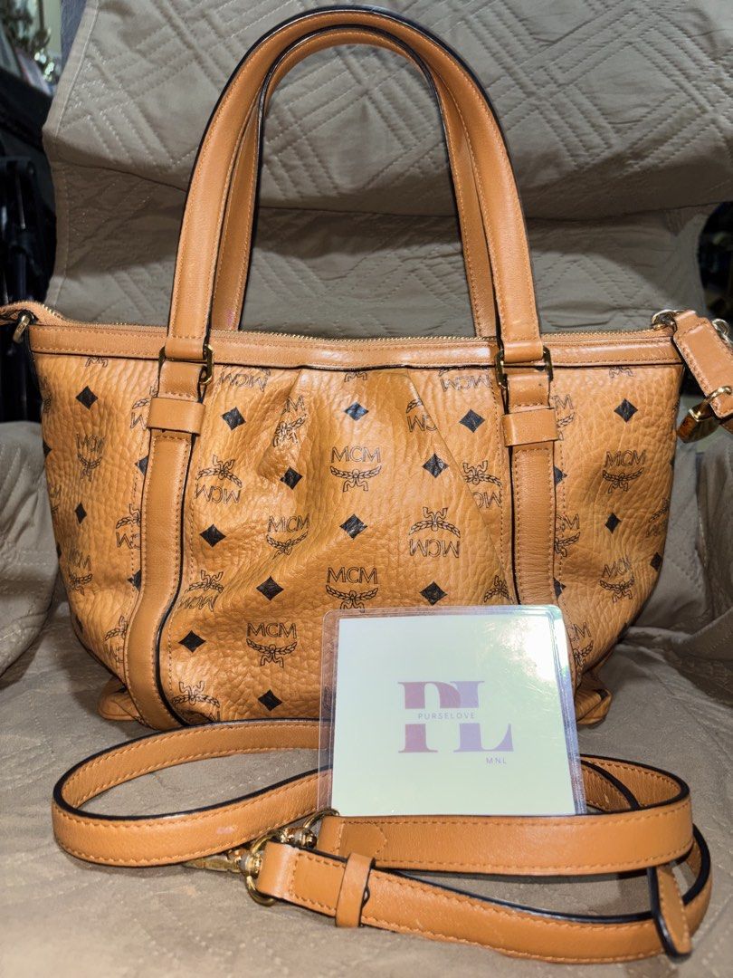 Mcm Cognac (Category: Luxury Bags & Wallets) located in Manila. Submitted by purselovemalate (Listing ID 1467481155, Image 2). Description: No major flaws with lock n key missing white tag ykk zip turnable screw no discoloration.