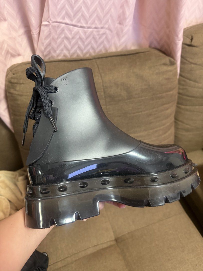 Melissa Spikes Platform Combat Boots Black (Category: Boots) located in Taguig. Submitted by monethambas (Listing ID 1467538369, Image 3). Description: - Brand: Melissa - Style: Platform combat boots in solid black - Material: 100% waterproof jelly construction - Features: Chunky lug sole, edgy spike detailing, thick lace-up closure, and convenient heel pull tab - Vibe: Bold statement footwear, ideal for rainy days or streetwear looks - Condition