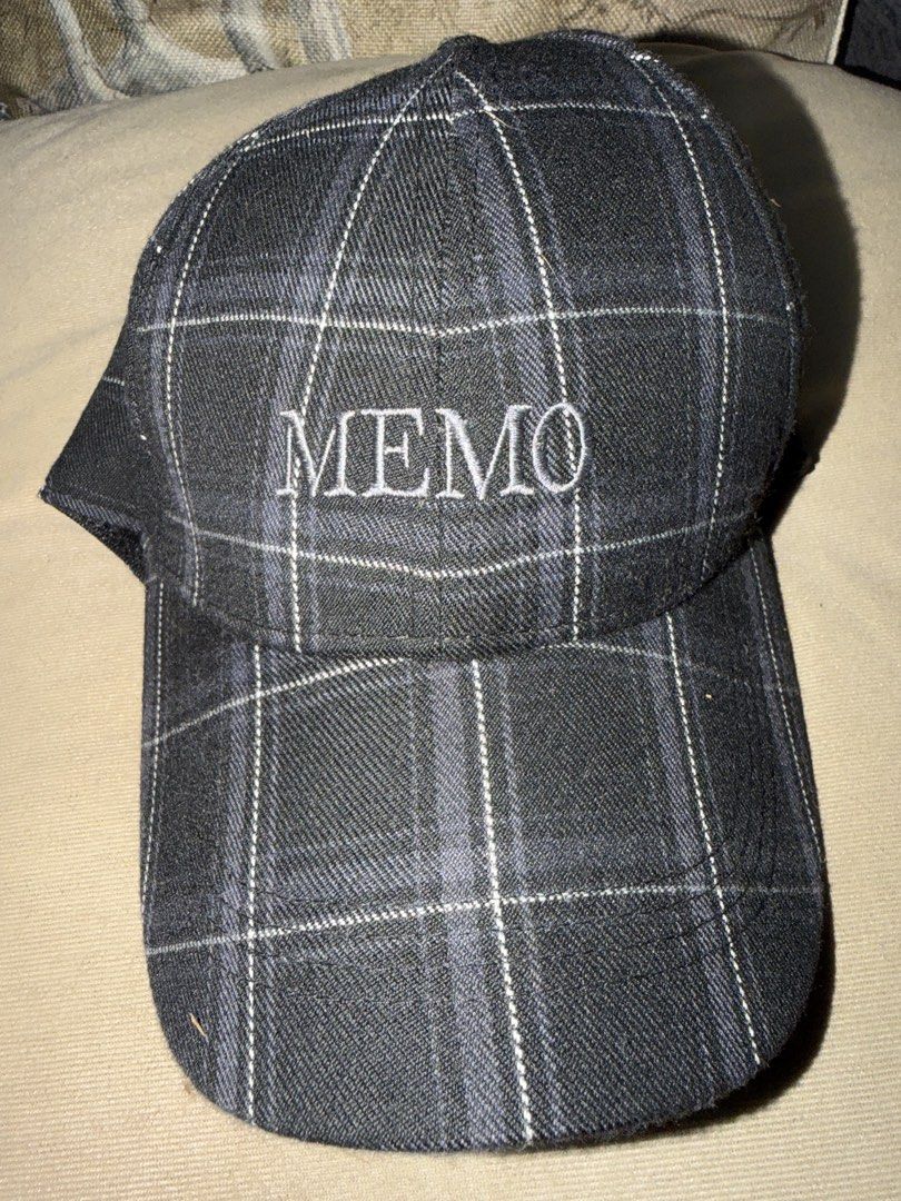 MEMO Plaid Baseball Cap One Size Fits All (Category: Caps & Hats) located in Manila. Submitted by janjewel072979 (Listing ID 1467529743, Image 1). Description: - Brand: MEMO - Design: Black and gray plaid with white embroidered lettering - Size: One size fits all with adjustable inner strap - Origin: Made in the Philippines - Care: Hand wash, hang to dry - Condition: Clean fabric construction ! Have 2 stocks ! Negotiable price.