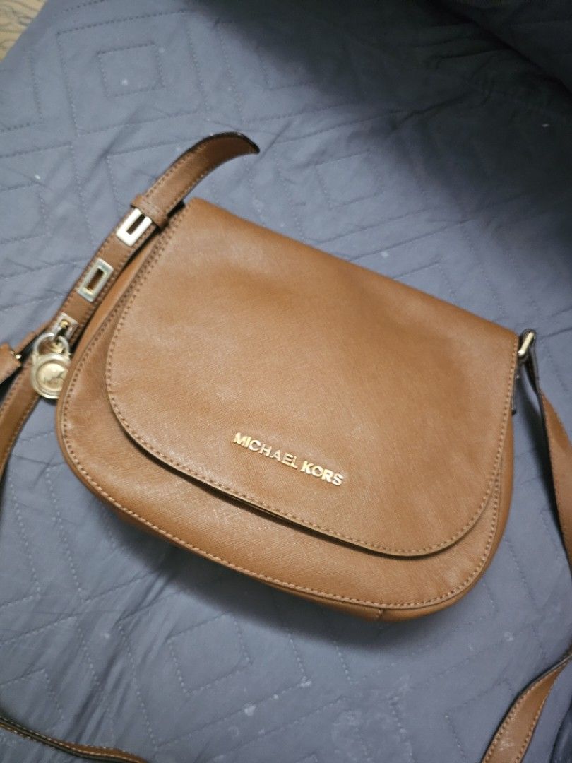 Michael Kors Bedford Flap (Category: Cross-body Bags) located in Manila. Submitted by shopaholicmimi (Listing ID 1467558621, Image 1). Description: 📍preloved with flaws (please see photos) rare style not coach, ergo, legacy, vintage, soho, saddle, zoe, carly, eastwest, patchwork, rare, canvas, signature, laurel, kili.