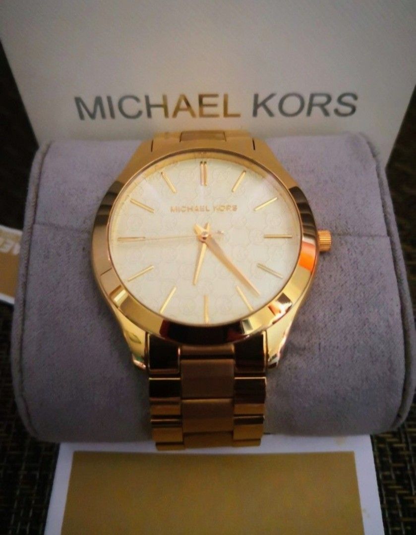 Michael Kors Slim Runway Watch (Category: Luxury Watches) located in Mandaluyong City. Submitted by ilovemyshop (Listing ID 1467401475, Image 2). Description: 💜 Perfect for everyday, the gold tone stainless Michael Kors Slim Runway three hand watch has a classic style. 💜 Case and dial round 42mm stainless steel case with a gold dial. 💜 Watch band gold stainless steel bracelet band, 30mm band width already adjusted to size 7 inches customized f