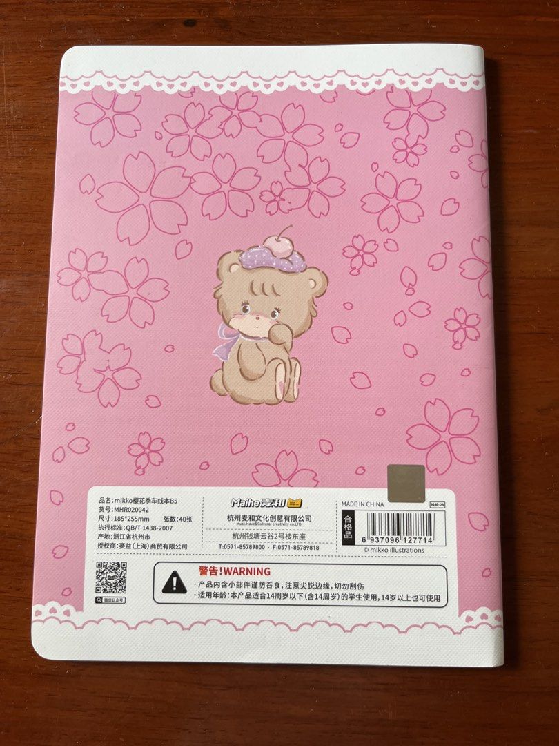 Mikko Latte Cherry Blossom B5 Notebook (Category: Stationery & School Supplies) located in Malolos. Submitted by mavi.annxo (Listing ID 1467388018, Image 2). Description: - Brand: Maihe (Series: Latte) - Design: Cute pink cherry blossom and bear - Size: B5 (185 x 255mm) - Pages: 40 sheets - Condition: Brand new, unused with original barcode and labels - Ideal for: Journaling, school notes, or collecting cute stationery.