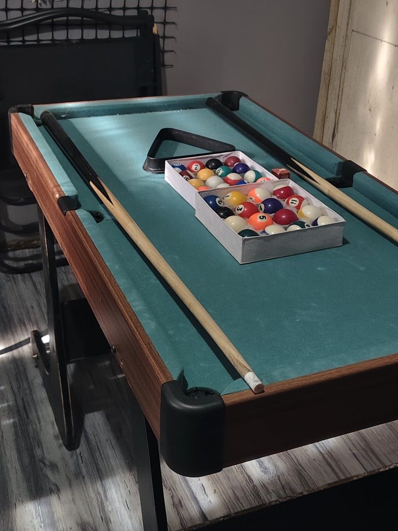 Mini Billiard (Category: Billiards and Bowling) located in Marikina City. Submitted by duaaaaa (Listing ID 1467476157, Image 2). Description: Mini billiard 🎱 95x50 cm Pwede pang business Pwede sa anak niyo para di na mangulit Inclusion 2 sets billiard ball 2 Cue stick (Medyo baliko na isa) 1 Tisa Rfs: Need space 2,500 Pick up or lalamove only. Location: Marikina city❗.