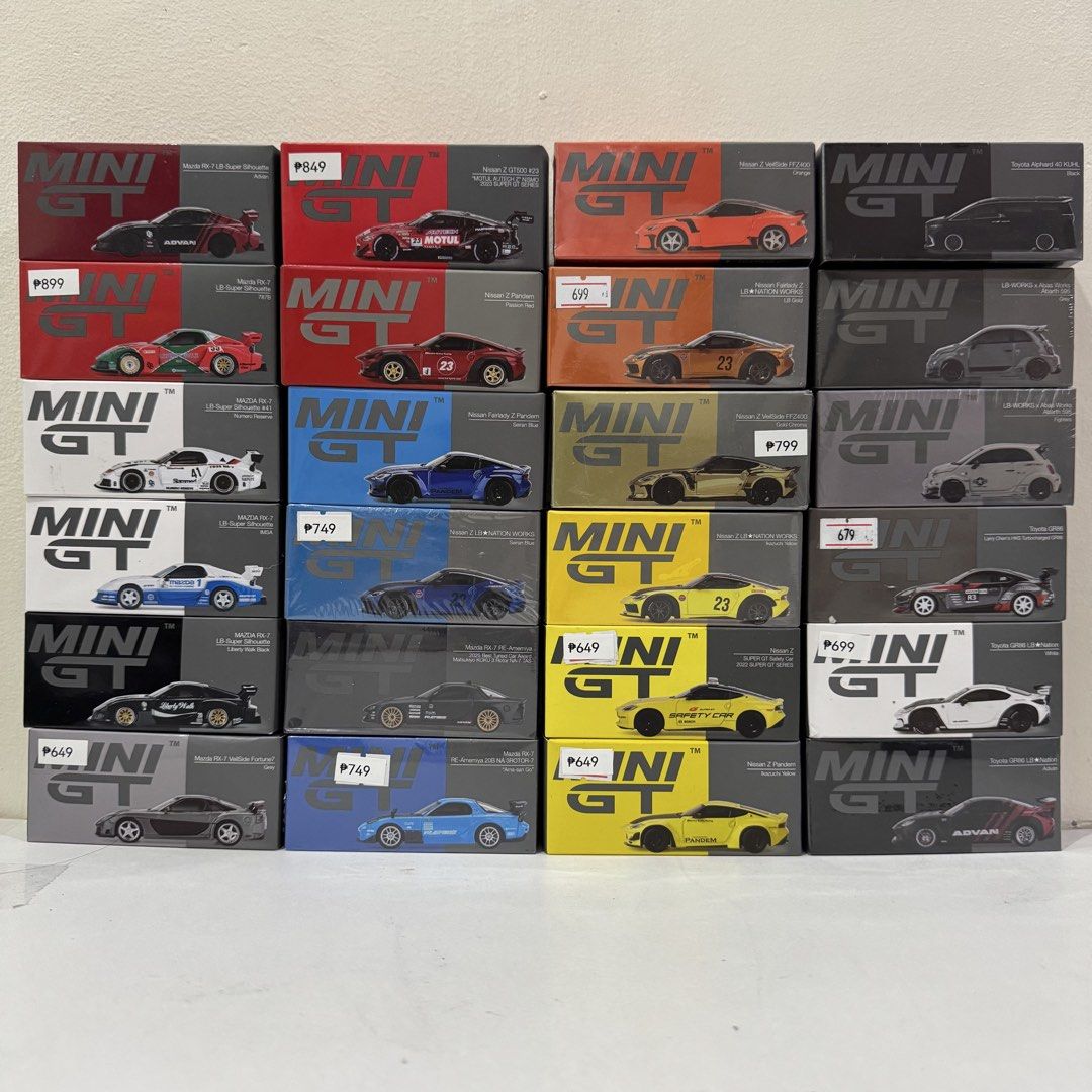 MINI GT Diecast (Category: Vehicle & Diecast Models) located in Manila. Submitted by oddwheels.mnl (Listing ID 1467371935, Image 3). Description: - Massive MINI GT scale model car collection available - Features various models from popular brands: Nissan, Honda, and Lamborghini - Boxes include various price stickers - Perfect addition to any diecast display shelf.