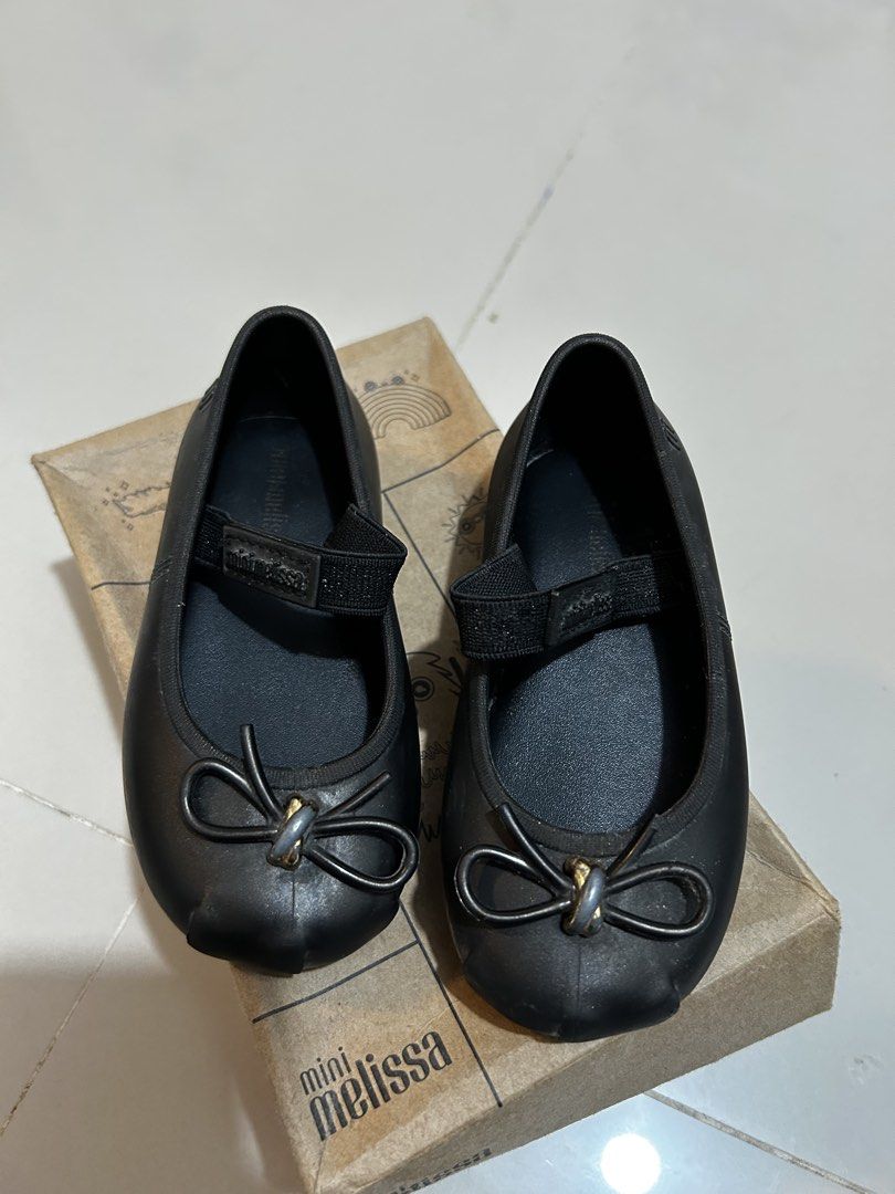 Mini Melissa Sophie BB US8 (Category: Babies & Kids Fashion) located in Antipolo. Submitted by mommytj (Listing ID 1467478320, Image 2). Description: - Brand: Mini Melissa Sophie BB - Color: Metallic Black - Size: USA 8 / EUR 24 / BRA 22 - Style: Classic slip-on Mary Jane with elastic strap and bow detail - Feature: Signature sweet bubblegum scent - Inclusion: Comes with original box .