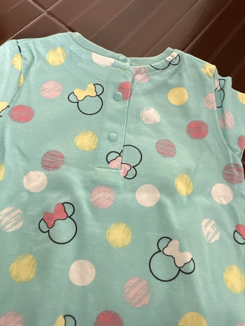 Minnie Mouse Polka Dot Pyjama Set Size 74cm (Category: Babies & Kids Fashion) located in Imus. Submitted by mamibinkz (Listing ID 1467385878, Image 2). Description: - Adorable light blue Minnie Mouse pyjama set with colorful polka dots - Size: 74cm 6-9m top 9-12m bottom - Includes short sleeves and matching long pants - Convenient shoulder button closure for easy dressing - Made from soft, breathable cotton for a comfortable night's sleep - Excel