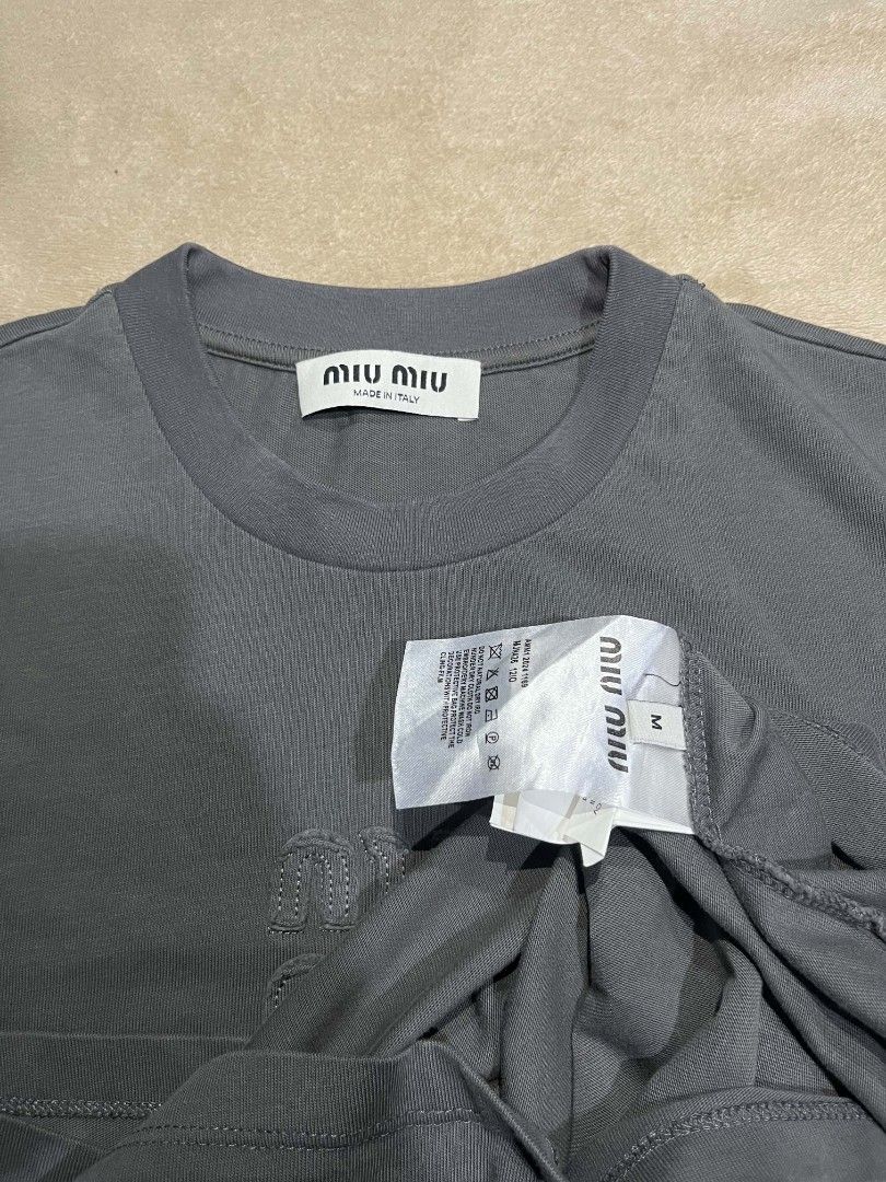 MIU MIU SHIRT (Category: Tshirts & Polo Shirts ) located in Quezon City. Submitted by jcrafty.co (Listing ID 1467529539, Image 2). Description: MIU MIU SHIRT EXCELLENT CONDITION NO ISSUE 19W 25L 799 ONLY NOVALICHES QC AREA 📥.