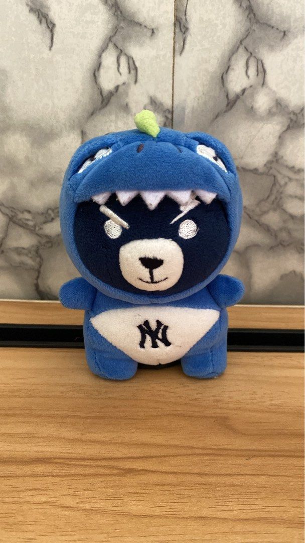 MLB Korea Dinosaur Mega Bear Plush Keyring (Category: Plushies & Soft Toys) located in Caloocan City. Submitted by izzyjelly (Listing ID 1467529252, Image 1). Description: - Adorable blue bear plush toy dressed in a fun dinosaur costume - Features the iconic New York Yankees logo on the front belly - Equipped with a sturdy silver keyring for easy attachment to bags or keys - Includes official MLB tag at the back for authenticity - Made with ultra
