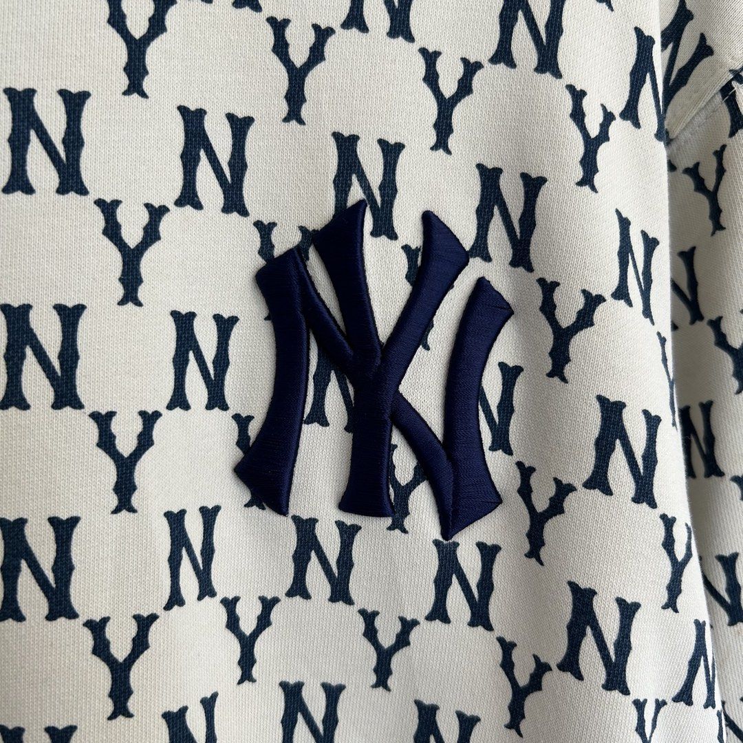 MLB New York Yankees Monogram Sweatshirt Off-White (Category: Coats, Jackets and Outerwear) located in Manila. Submitted by jakes_thrift_shop (Listing ID 1467510437, Image 2). Description: - Brand: MLB New York Yankees - Item: Monogram Sweatshirt - Color: Off-white with all-over navy monogram print - Size: L (tag attached) - Details: Embroidered team logo patch on chest, classic crewneck, ribbed collar, cuffs, and hem - Material: Comfortable heav