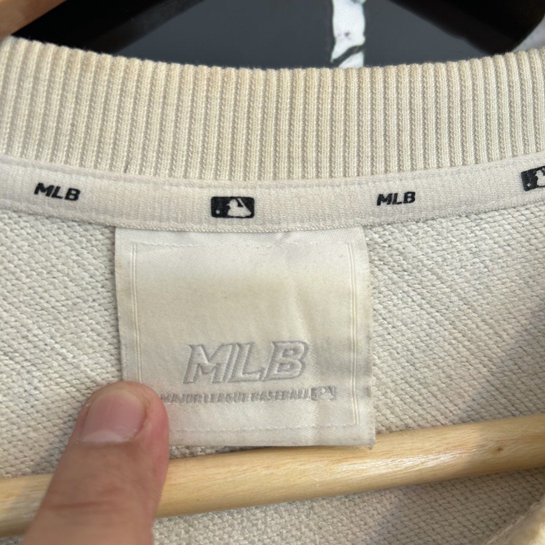MLB New York Yankees Monogram Sweatshirt Off-White (Category: Coats, Jackets and Outerwear) located in Manila. Submitted by jakes_thrift_shop (Listing ID 1467510437, Image 3). Description: - Brand: MLB New York Yankees - Item: Monogram Sweatshirt - Color: Off-white with all-over navy monogram print - Size: L (tag attached) - Details: Embroidered team logo patch on chest, classic crewneck, ribbed collar, cuffs, and hem - Material: Comfortable heav