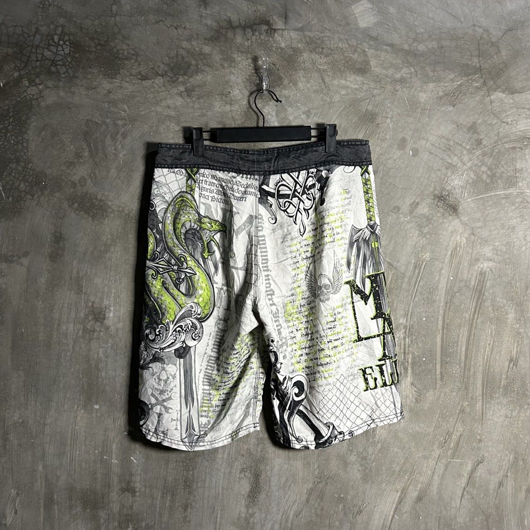 MMA Elite - Snake Graphic Boardshort (Category: Swim Trunks & Board Shorts) located in Tayabas. Submitted by streetdepartment (Listing ID 1467544205, Image 3). Description: MMA Elite - Snake Graphic Boardshort Very good condition Flaw/s: minor stain and issue sa MMA Rubber Size: Medium on tag Measurements (inches): Waist: 34” Length: 22” Leg opening: 12” Dm to purchase! Note: Manage your expectations as you are dealing with secondhand items. Colo