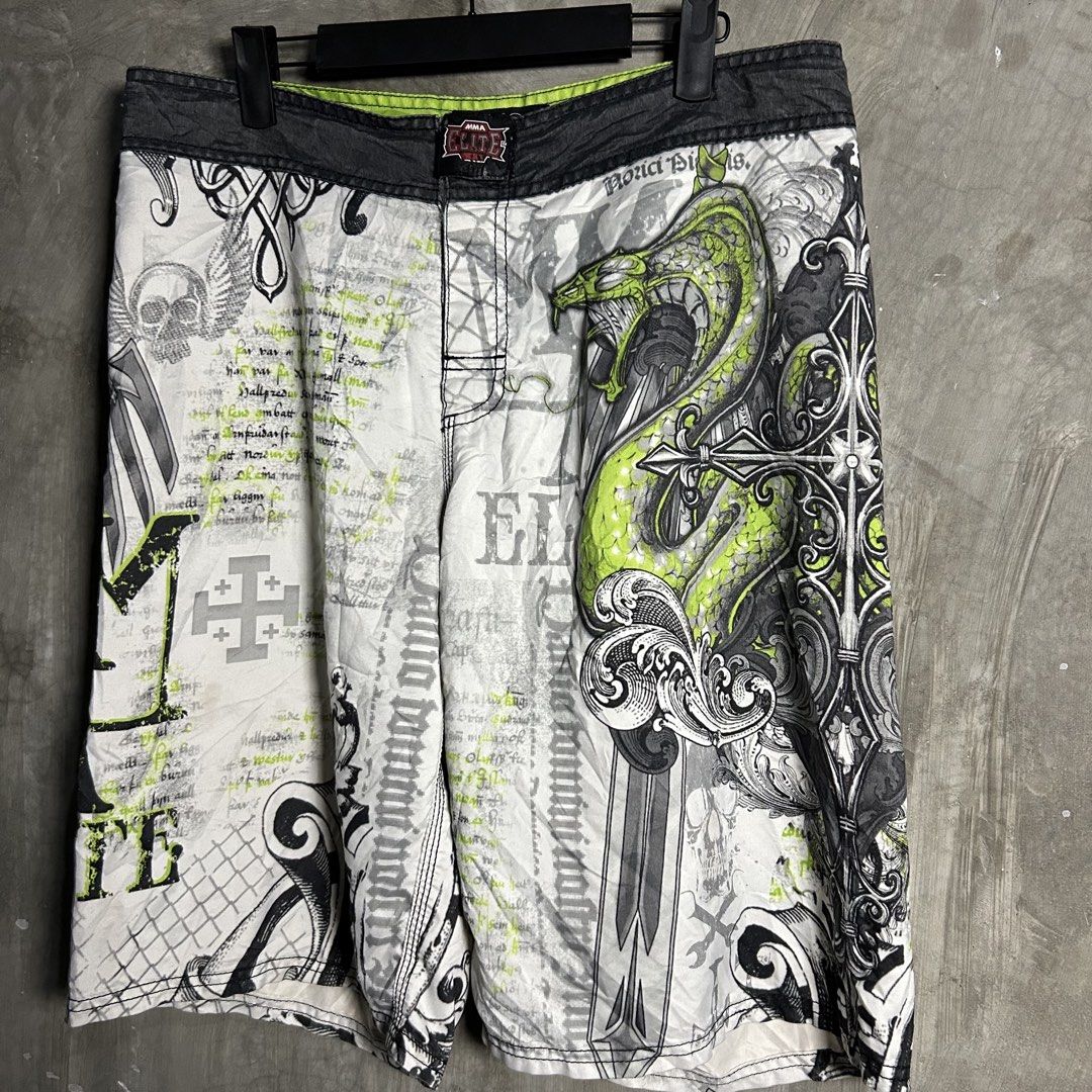 MMA Elite - Snake Graphic Boardshort (Category: Swim Trunks & Board Shorts) located in Tayabas. Submitted by streetdepartment (Listing ID 1467544205, Image 2). Description: MMA Elite - Snake Graphic Boardshort Very good condition Flaw/s: minor stain and issue sa MMA Rubber Size: Medium on tag Measurements (inches): Waist: 34” Length: 22” Leg opening: 12” Dm to purchase! Note: Manage your expectations as you are dealing with secondhand items. Colo