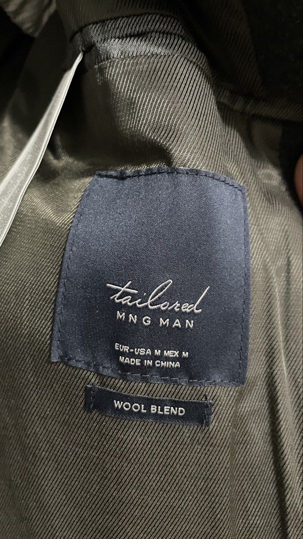 MNG Man Tailored Wool Blend Overcoat Size M (Category: Coats, Jackets and Outerwear) located in Taguig. Submitted by declutteringmommacat (Listing ID 1467551303, Image 2). Description: - can fit small to medium. Used only once Brand/Model: MNG Man Tailored Overcoat - Color: Dark Grey - Size: Medium (Regular Fit) - Material: Warm wool blend with comfortable inner lining - Design: Classic notched lapel collar, structured shoulders, and three-button