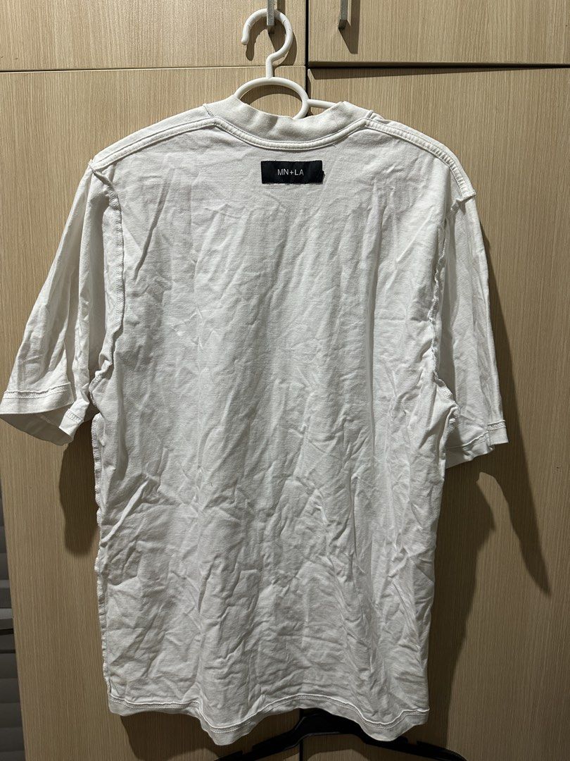 MN+LA White Tee Size L (Category: Tshirts & Polo Shirts ) located in Mandaluyong City. Submitted by _s3ll3r (Listing ID 1467455334, Image 2). Description: - Brand: MN+LA - Color: Classic White - Size: Large (L) - Style: Crew neck basic tee with stylish exposed seam details on shoulders and sides - Fit: Comfortable and great for daily wear - Condition: Excellent / Ready to ship - Mode of Payment: GCash or bank transfer - Shipping: Via J&T Express 