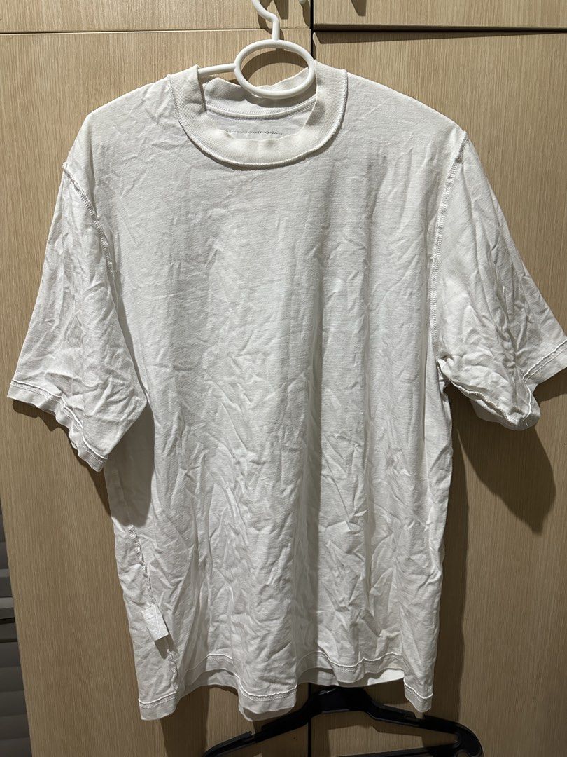 MN+LA White Tee Size L (Category: Tshirts & Polo Shirts ) located in Mandaluyong City. Submitted by _s3ll3r (Listing ID 1467455334, Image 3). Description: - Brand: MN+LA - Color: Classic White - Size: Large (L) - Style: Crew neck basic tee with stylish exposed seam details on shoulders and sides - Fit: Comfortable and great for daily wear - Condition: Excellent / Ready to ship - Mode of Payment: GCash or bank transfer - Shipping: Via J&T Express 