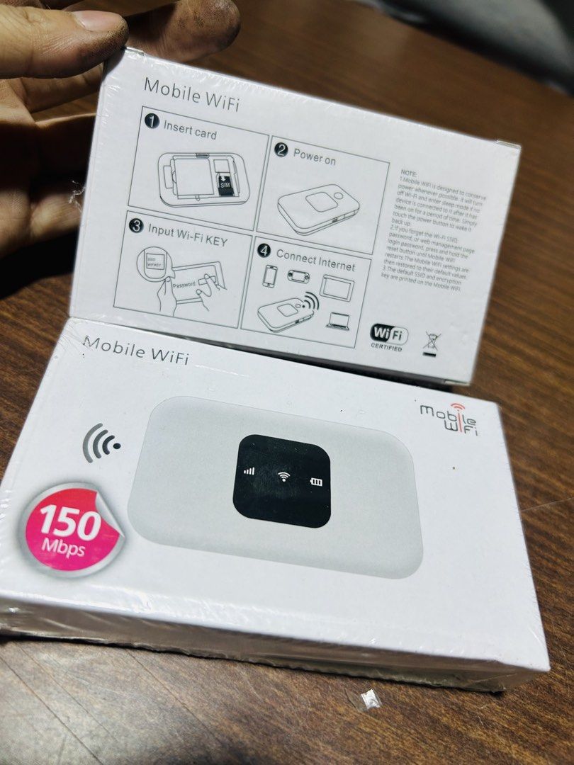 Mobile WiFi Router 150 Mbps Pocket Hotspot (Category: Networking) located in Manila. Submitted by starbalesukandjapansurplus (Listing ID 1467560669, Image 1). Description: - Brand new, still sealed in plastic wrap - Portable 4G mobile WiFi router in a sleek white design - Fast internet speeds up to 150 Mbps - Easy to use: just insert a SIM card and power it on - Convenient status indicator lights on the front - Hassle-free setup with instructions