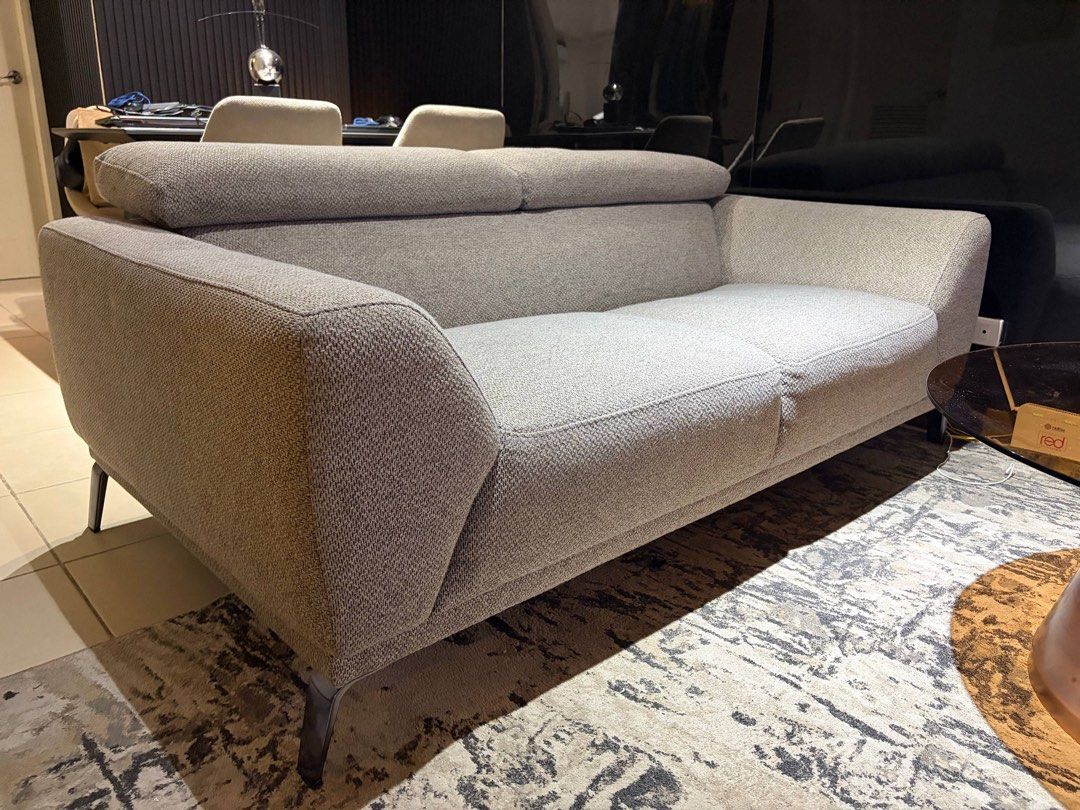 Modern Grey Fabric 2-Seater Sofa with Adjustable Headrests (Category: Sofas) located in Manila. Submitted by iammaleficent18 (Listing ID 1467511174, Image 2). Description: - Style: Modern 2-seater loveseat with clean lines - Material: Premium textured grey fabric - Legs: Sleek dark finish metal legs - Comfort: Features two adjustable back cushions and solid armrests - Versatile: Ideal for living rooms, condo units, or office spaces - Dimensions: 