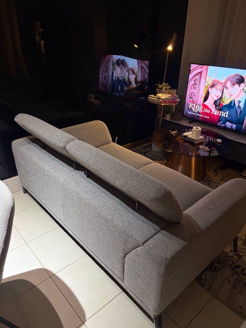 Modern Grey Fabric 2-Seater Sofa with Adjustable Headrests (Category: Sofas) located in Manila. Submitted by iammaleficent18 (Listing ID 1467511174, Image 3). Description: - Style: Modern 2-seater loveseat with clean lines - Material: Premium textured grey fabric - Legs: Sleek dark finish metal legs - Comfort: Features two adjustable back cushions and solid armrests - Versatile: Ideal for living rooms, condo units, or office spaces - Dimensions: 
