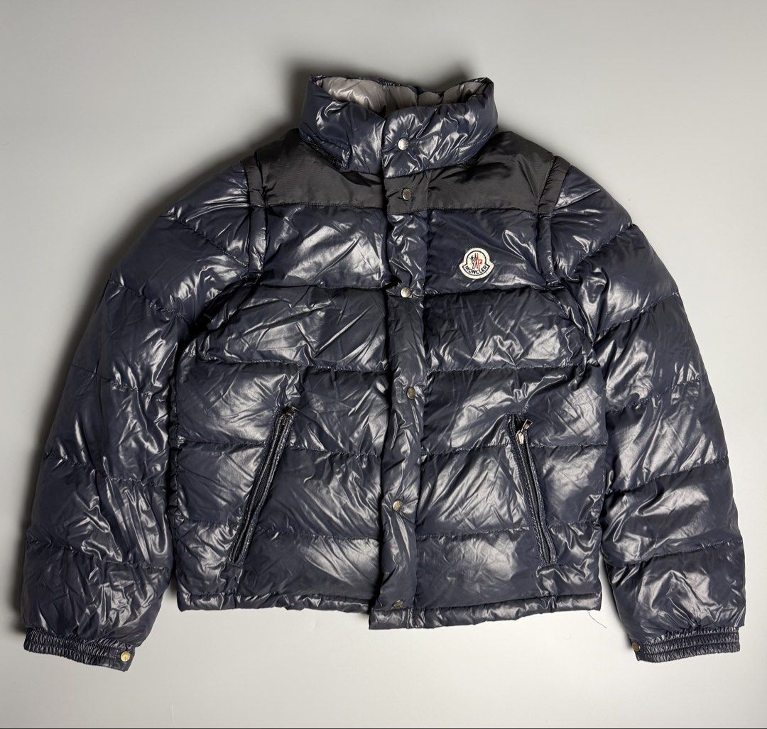 Moncler Kids Andersen Puffer Down Jacket Navy Blue (Category: Kids Wardrobes & Storage) located in Manila. Submitted by limsanity03 (Listing ID 1467524851, Image 1). Description: - Moncler puffer jacket in navy blue - Contrasting dark shoulder panel and silver hardware - Signature felt logo patch on the left chest - Branded zipper pulls and engraved snap buttons - Issue Missing Hood actual dimes width 28 length 22 shoulder to Shoulder 14.5 sleeve