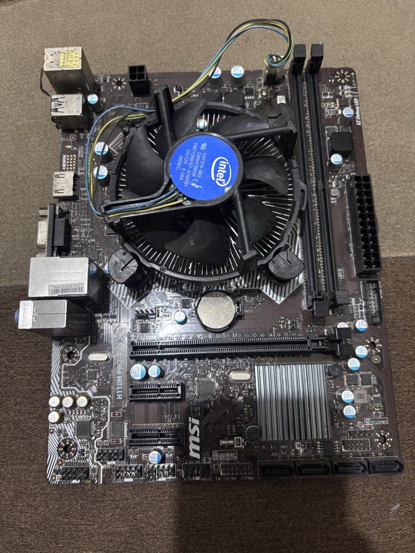 Motherboard processor with fan no backplate (Category: Desktops) located in Navotas City. Submitted by jerfratz (Listing ID 1467519945, Image 1). Description: Intel core i3 7th gen Msi morherboard ddr4 no backplate only In good condition no issue Location nbbs navotas .
