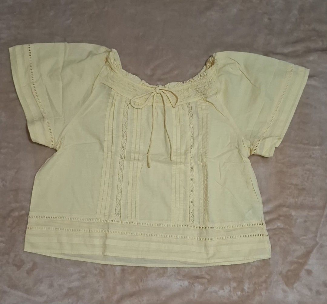 Marks & Spencer Lace Boho Peasant Blouse (Yellow) - Worn Once (Category: Blouses) located in Quezon City. Submitted by MP_Declutters (Listing ID 1467429122, Image 1). Description: Description: ✨ M&S Pastel Yellow Boho-Chic Blouse ✨ Brand: Marks & Spencer (M&S) Size: UK 14 / EU 42 (Fits Medium to Large comfortably due to the relaxed cut) Color: Pastel Butter Yellow Style: Peasant/boho style with a gathered scoop neck, front tie detail, vertical cr