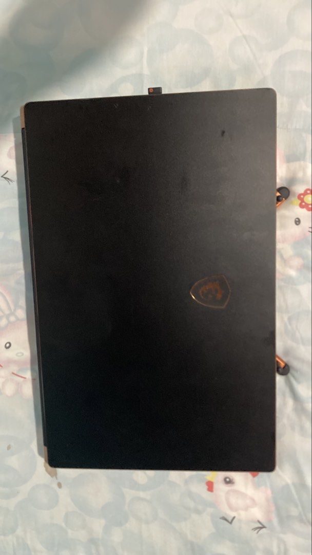 MSI GS75 Stealth 9SF Gaming Laptop (Category: Laptops & Notebooks) located in Quezon City. Submitted by brian376 (Listing ID 1467516809, Image 1). Description: - Model: MSI GS75 Stealth 9SF Gaming Laptop - Processor: Intel Core i7-9750H @ 2.60GHz - Graphics: NVIDIA GeForce RTX 2070 Max-Q - Memory: 16GB RAM - Storage: 954GB - OS: Windows 11 Home - Design: Black chassis with gold accents & customizable RGB backlit keyboard - Ports: Multiple USB por