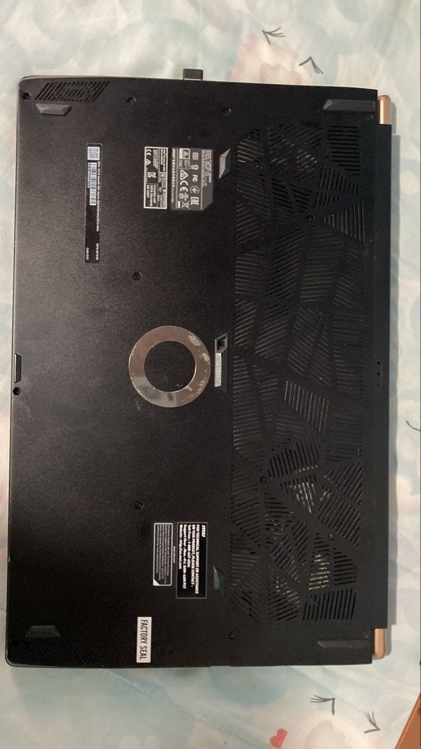 MSI GS75 Stealth 9SF Gaming Laptop (Category: Laptops & Notebooks) located in Quezon City. Submitted by brian376 (Listing ID 1467516809, Image 3). Description: - Model: MSI GS75 Stealth 9SF Gaming Laptop - Processor: Intel Core i7-9750H @ 2.60GHz - Graphics: NVIDIA GeForce RTX 2070 Max-Q - Memory: 16GB RAM - Storage: 954GB - OS: Windows 11 Home - Design: Black chassis with gold accents & customizable RGB backlit keyboard - Ports: Multiple USB por
